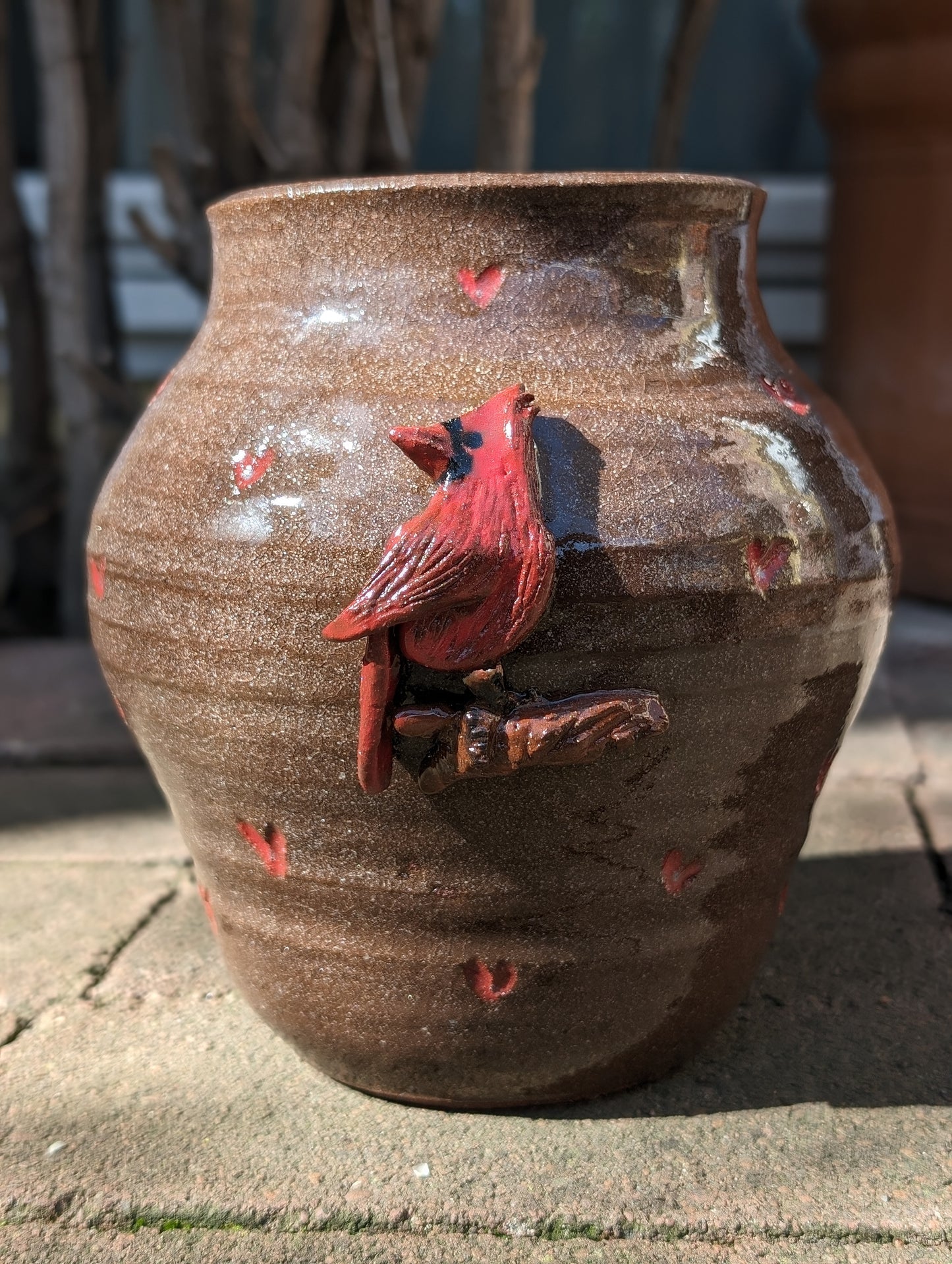 Enchanted Heart: Handcrafted Cardinal Vase Captures Spring's Majesty